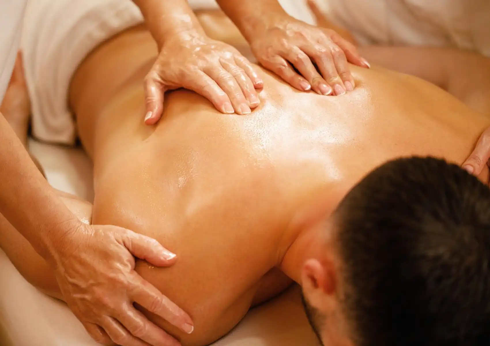 Synchronised four hands massage for deep muscle relaxation at Akoya Spa Ubud Bali