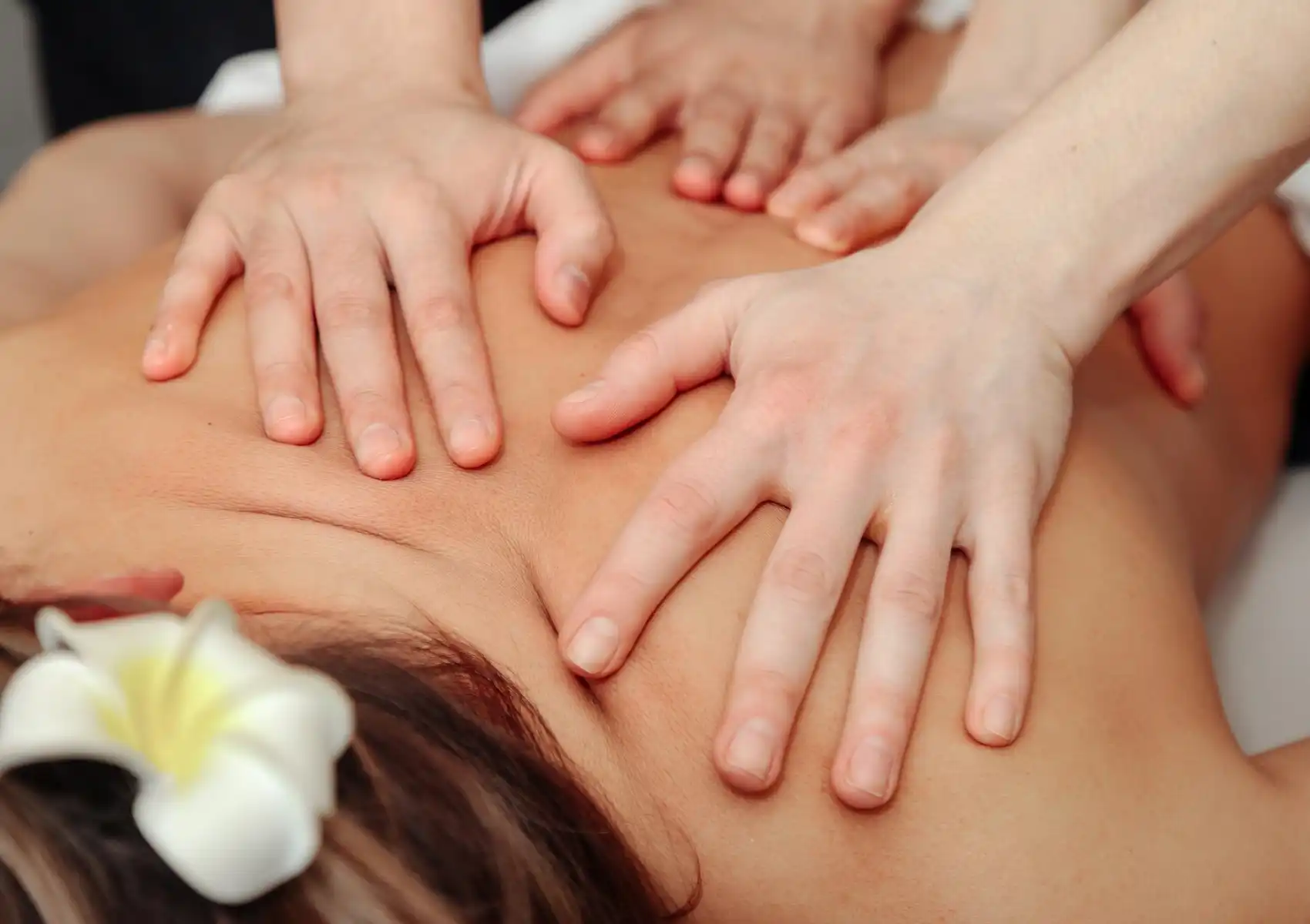 Balinese four hands massage treatment for back tension relief at Akoya Spa Ubud Bali